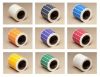 Security labels on rolls in various colours