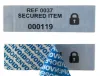 Paper security labels sealed and unsealed showing void