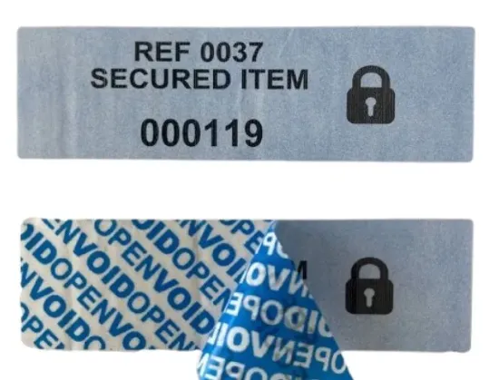 Paper security labels sealed and unsealed showing void